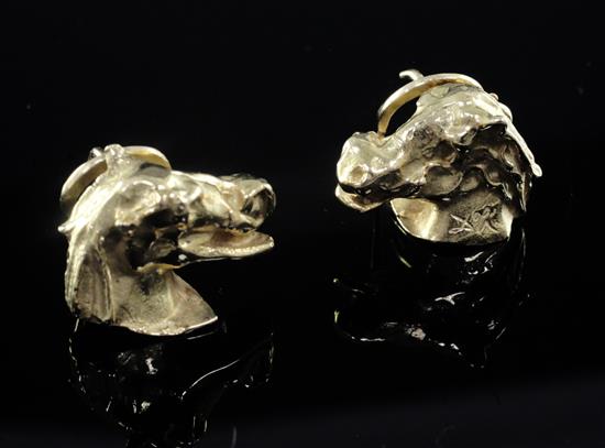 A pair of 1990s 18ct gold earrings, modelled after Dalis Laughing Horse Head, 12mm.